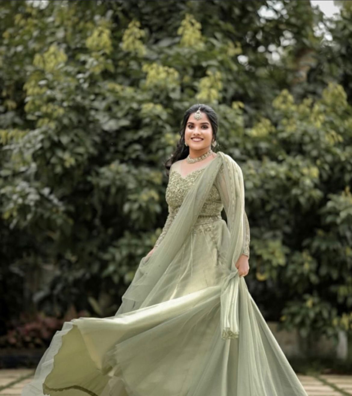 pista green embroidered silk lehenga set